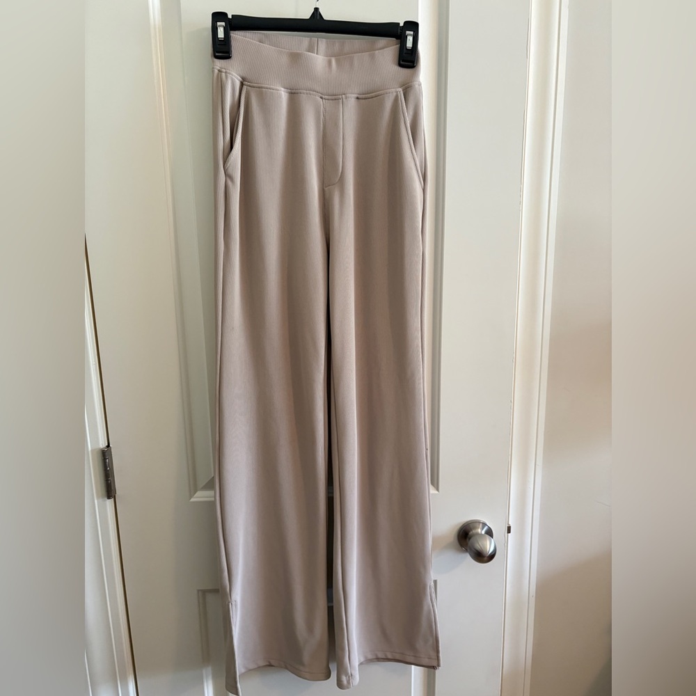 Wide legged yoga pants in light cream by Move Theology. Size Small.
